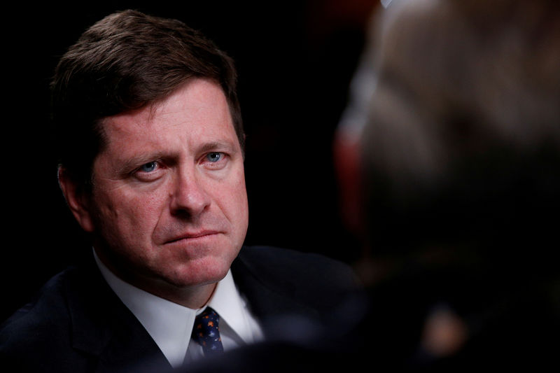 © Reuters. FILE PHOTO: Jay Clayton, Chairman of the Securities and Exchange Commission, listens during an interview with CNBC at the Sandler O'Neill + Partners Global Exchange and Brokerage Conference in New York