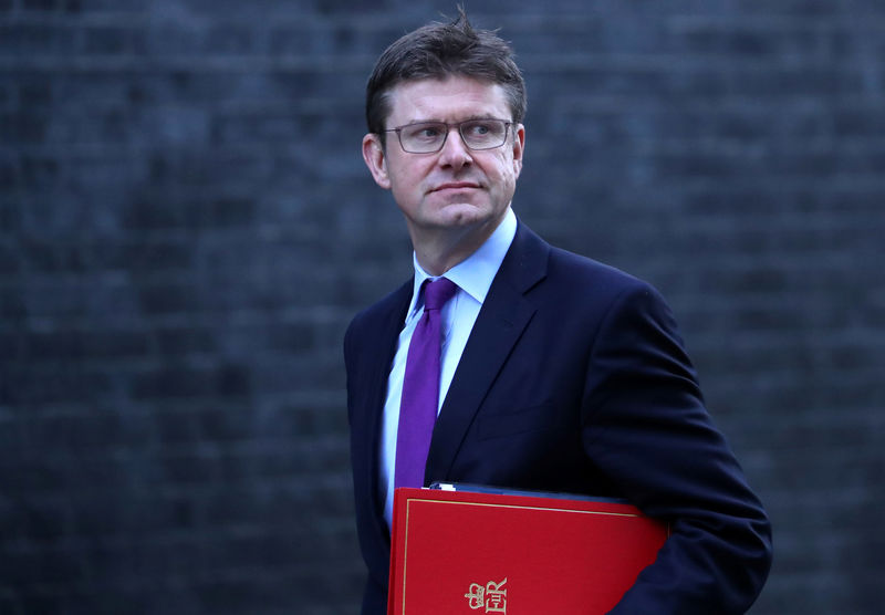 © Reuters. FILE PHOTO:  Britain's Secretary of State for Business, Greg Clark, arrives in Downing Street, London