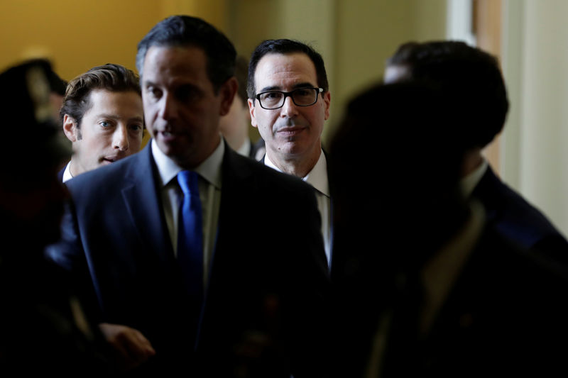 © Reuters. Treasury Secretary Steve Mnuchin walks on Capitol Hill in Washington