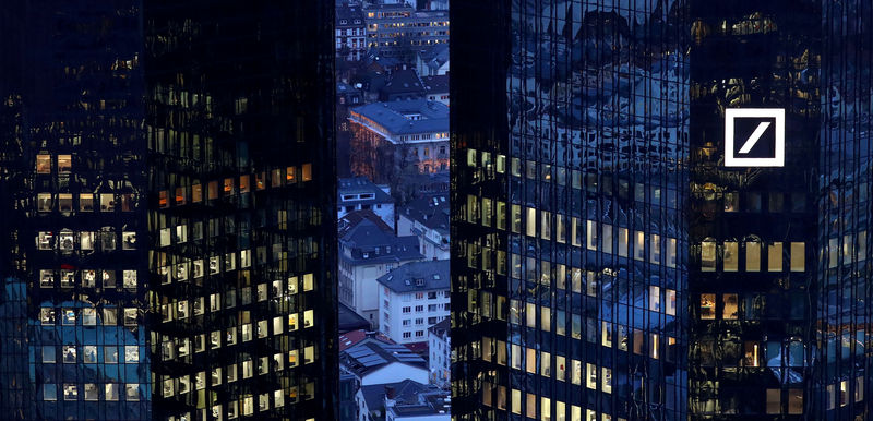© Reuters. FILE PHOTO: The headquarters of Germany's Deutsche Bank are seen early evening in Frankfurt