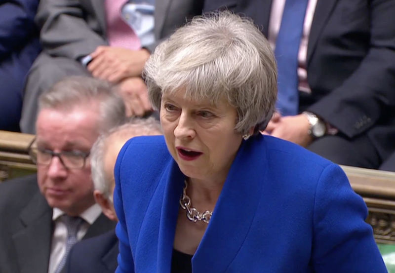 © Reuters. British Prime Minister Theresa May speaks after winning a confidence vote, after Parliament rejected her Brexit deal, in London