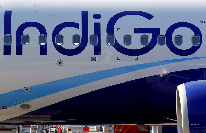 © Reuters. FILE PHOTO: The logo of IndiGo Airlines is pictured on passenger aircraft on the tarmac in Colomiers near Toulouse