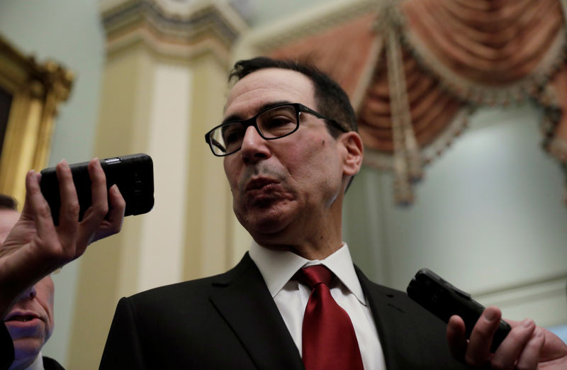 © Reuters. U.S. Treasury Secretary Mnuchin speaks to Capitol Hill reporters in Washington