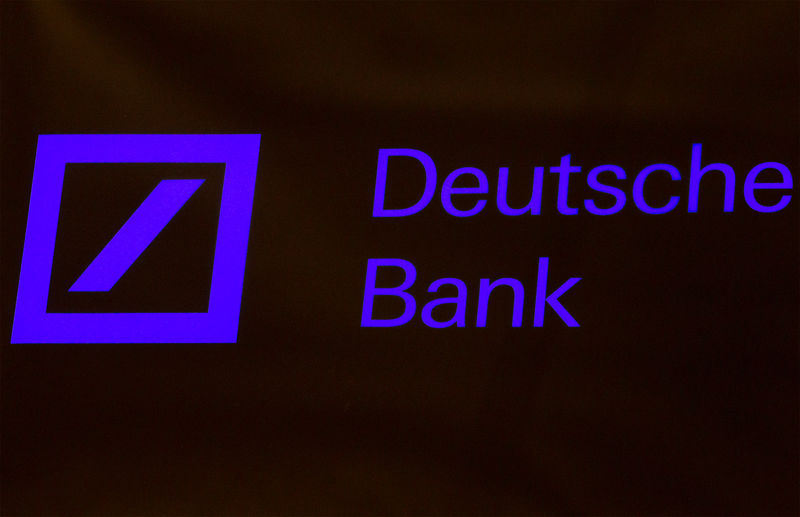 © Reuters. FILE PHOTO: A Deutsche Bank sign is seen on the floor of the New York Stock Exchange