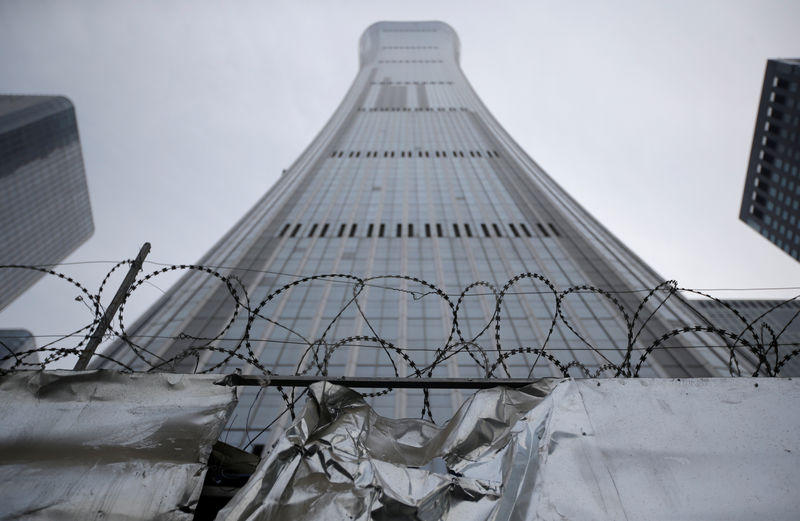 © Reuters. A fence is pictured outside at the construction site of China Zun Tower in Beijing's central business area