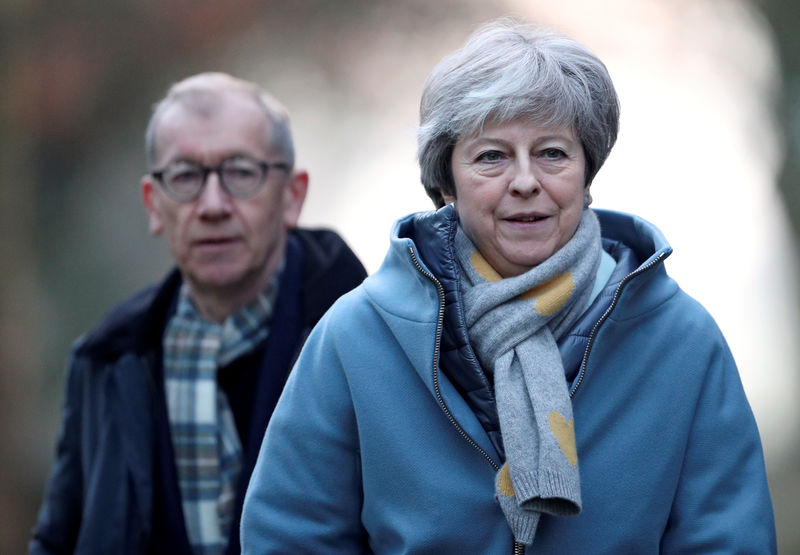 © Reuters. Britain's Prime Minister Theresa May and her husband Philip leave church, near High Wycombe