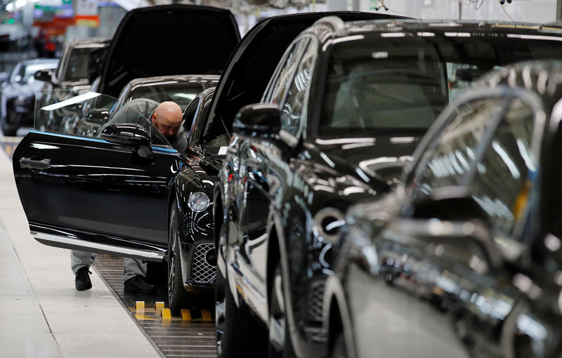 © Reuters. Bentley cars go through final quality control as they come off the production line at their factory in Crewe