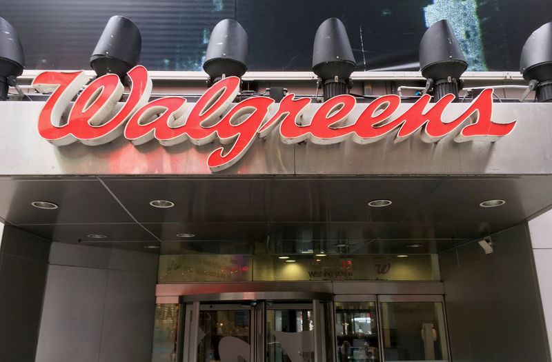 © Reuters. FILE PHOTO: The Walgreens logo is seen outside the store in Times Square in New York