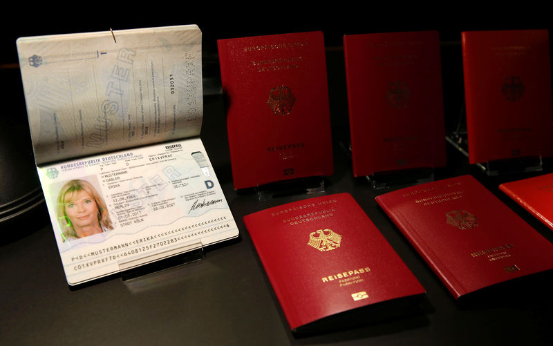 © Reuters. Specimens of the German new electronic passports are pictured during a presentation to the media in Berlin