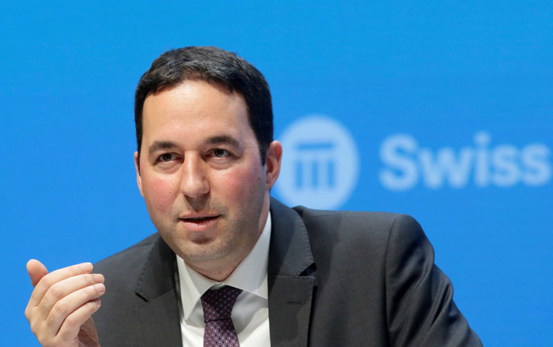 © Reuters. FILE PHOTO: CEO Mumenthaler of the world's second largest reinsurer Swiss Re addresses a news conference to present the company's full year results, in Zurich