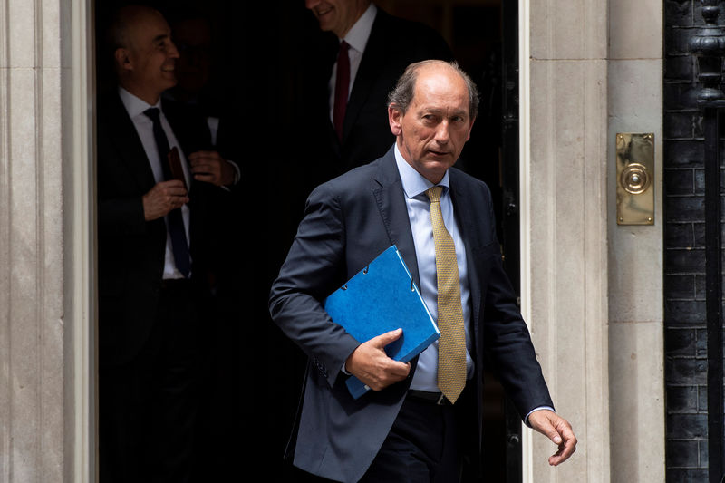 © Reuters. FILE PHOTO: Paul Bulcke, Chairman of Nestle, leaves 10 Downing Street in London