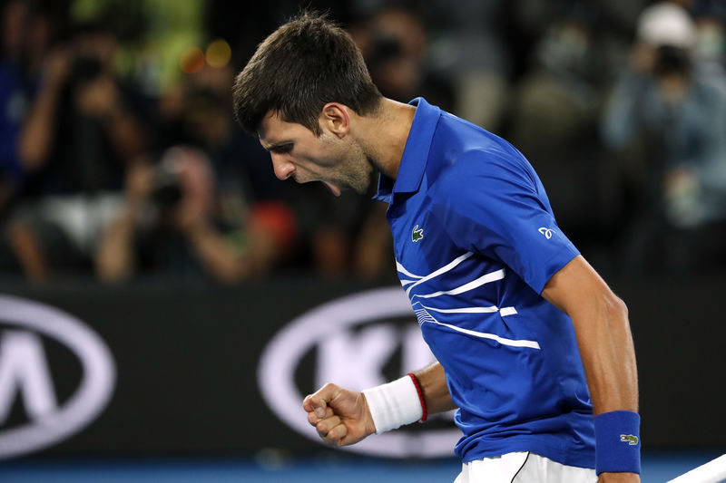 © Reuters. Djokovic aplasta a Nadal para hacerse con su séptimo Open de Australia