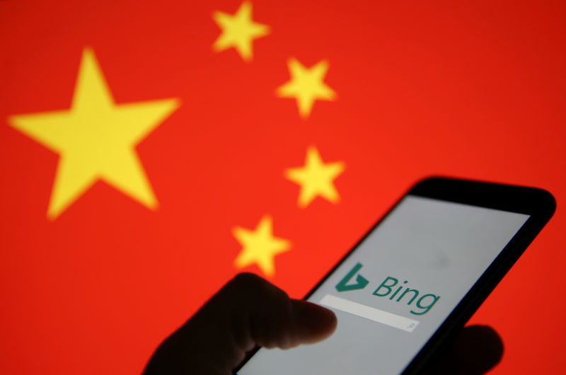 © Reuters. A smartphone with the Microsoft Bing logo is displayed against the backdrop of a Chinese flag in this picture illustration