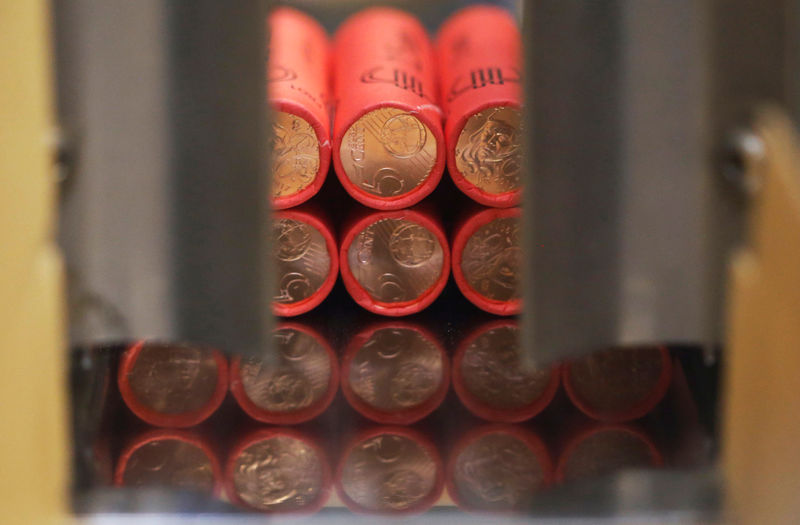 © Reuters. Rolls of newly-minted 5 cent euro coins are pictured at the "Monnaie de Paris", national mint factory in Pessac