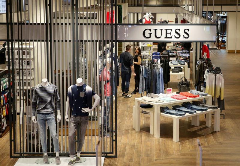 © Reuters. Employees wait for customers in the Guess section in the Central Universal Department Store (TsUM) in Kiev