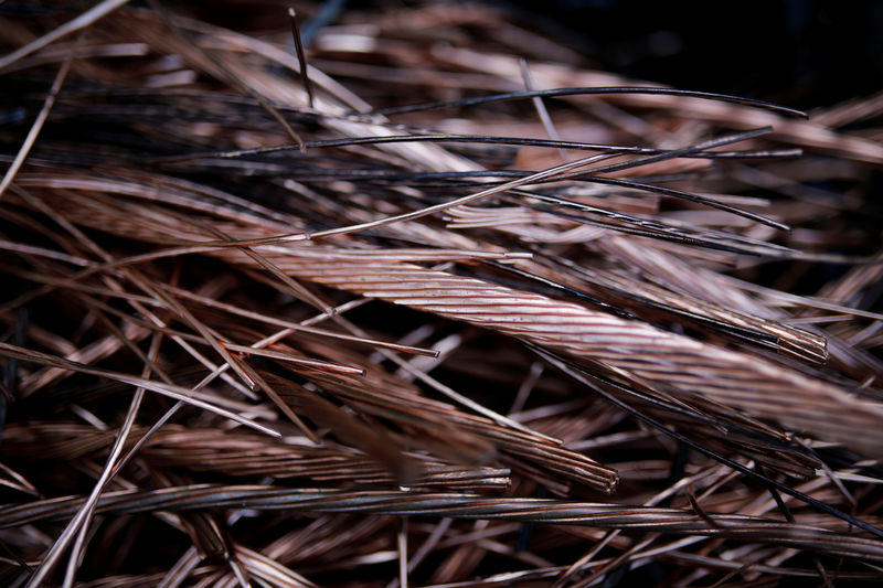 © Reuters. FILE PHOTO: Copper cables to be melted in a cauldron at the Galanopoulos bell foundry in Paramythia, Greece