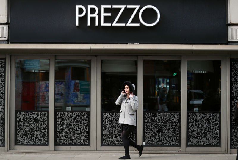 © Reuters. A woman walks past a Prezzo restaurant in London