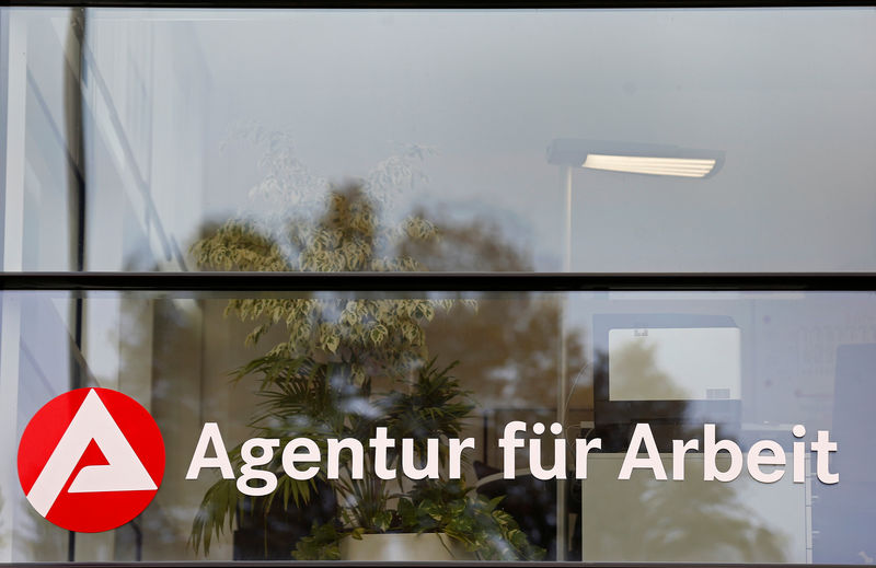 © Reuters. FILE PHOTO: The logo German National Agency for Employment (Agentur fur Arbeit) is seen at the joint German-French job center office in Kehl, Germany