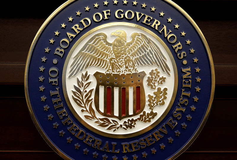 © Reuters. FILE PHOTO: The seal for the Board of Governors of the Federal Reserve System is displayed in Washington