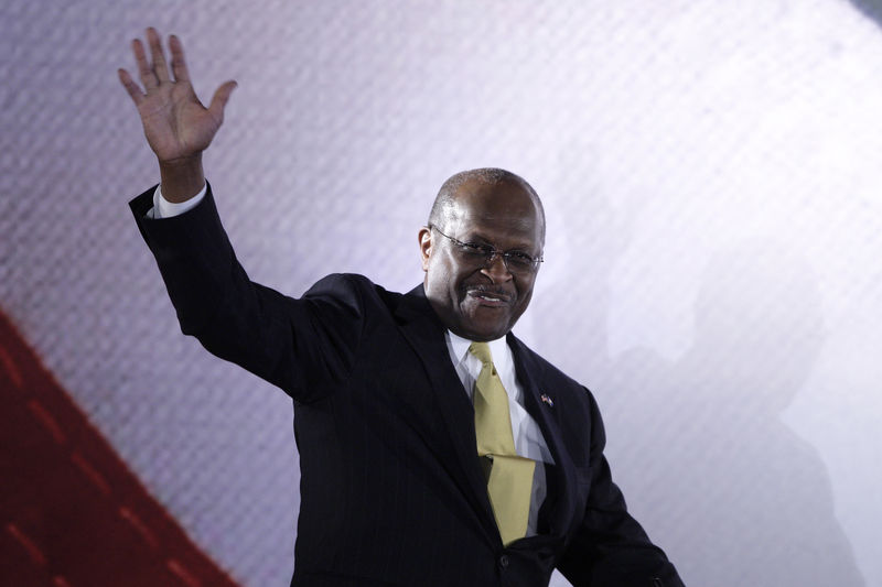 © Reuters. Former Republican presidential candidate Herman Cain waves as he take the stage to address the Faith & Freedom Coalition Road to Majority Conference in Washington