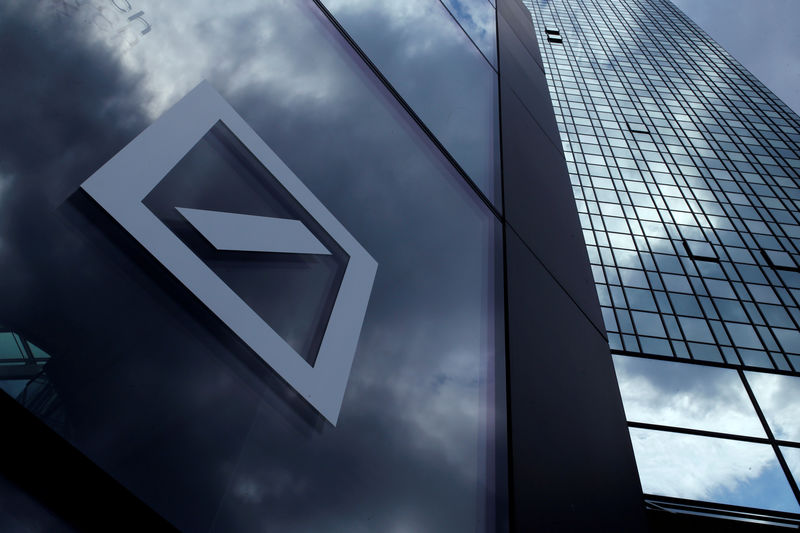 © Reuters. FILE PHOTO: A Deutsche Bank logo adorns a wall at the company's headquarters in Frankfurt