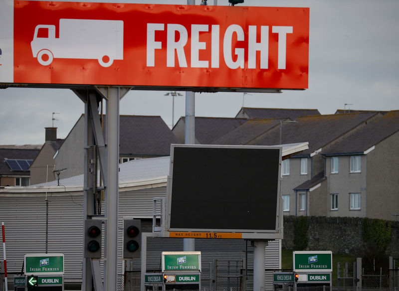 © Reuters. Signage directing lorries onto Dublin bound ferries is seen at the port of Holyhead on the island of Anglesey