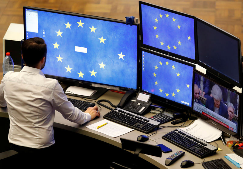 © Reuters. A share trader starts his trading systems at the start of the trading session the day after the Brexit deal vote of the British parliament at the stock exchange  in Frankfurt