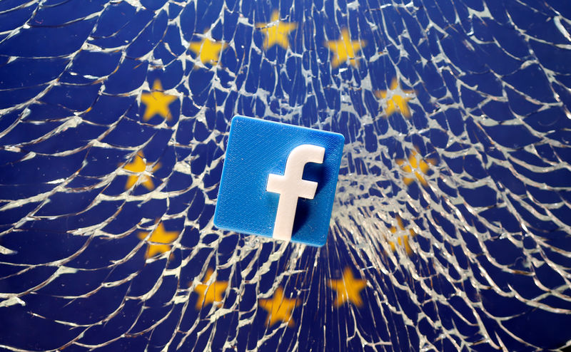 © Reuters. A 3D printed Facebook logo is placed on broken glass above a printed EU flag in this illustration