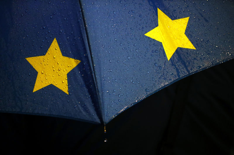 © Reuters. An umbrella is pictured during an anti-Brexit demonstration outside the Houses of Parliament, in Westminster, London