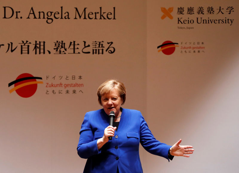 © Reuters. German Chancellor Merkel speaks during her talk with students at Keio University in Tokyo