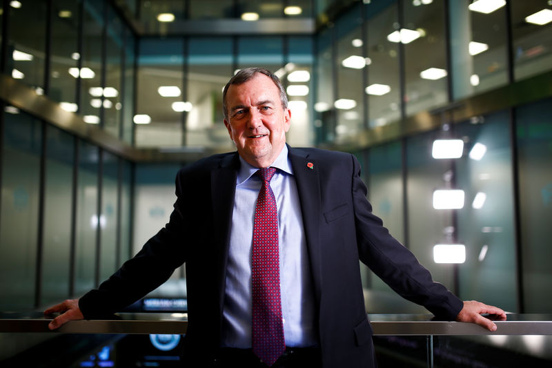 © Reuters. CEO of Randgold Mark Bristow poses for a photograph at the London Stock Exchange, London