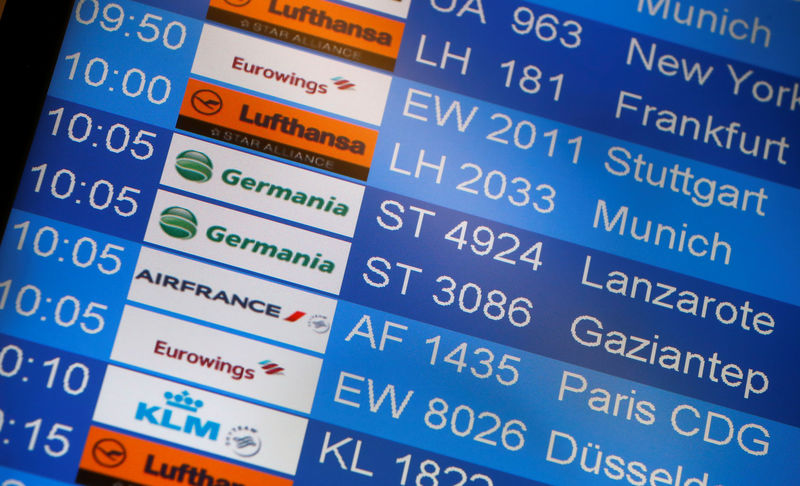 © Reuters. A message board with flights of German airlines Germania is pictured at Tegel airport in Berlin