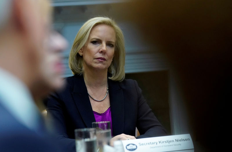 © Reuters. FILE PHOTO: U.S. Secretary of Homeland Security Nielsen listens as President Trump hosts a roundtable with Hispanic pastors in Washington