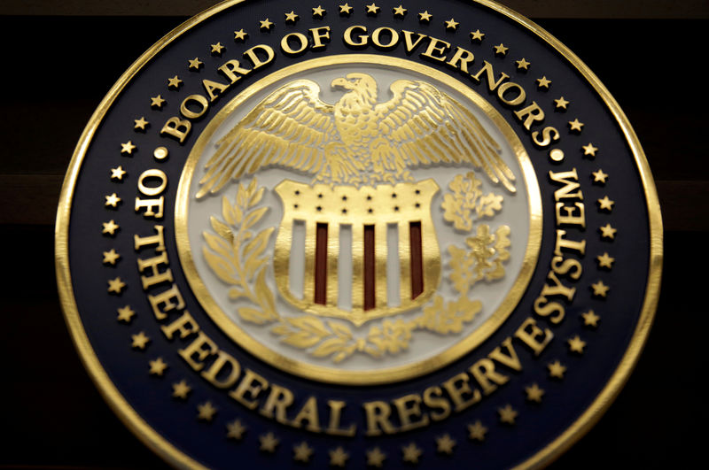 © Reuters. FILE PHOTO: The seal for the Board of Governors of the Federal Reserve System is displayed in Washington