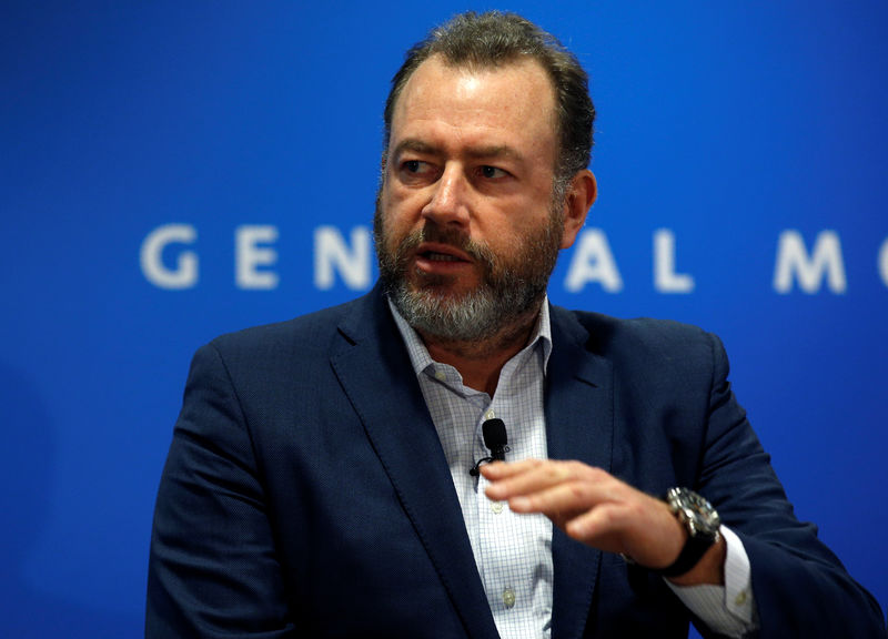 © Reuters. FILE PHOTO: GM's Amman speaks at press conference at the North American International Auto Show in Detroit