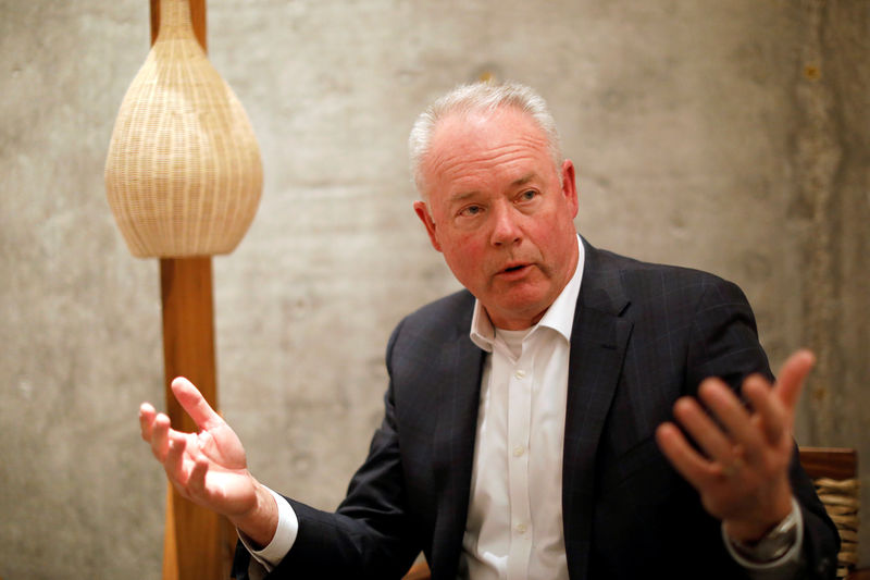 © Reuters. Starbucks CEO Kevin Johnson, gestures during an during an interview with Reuters in Mexico City