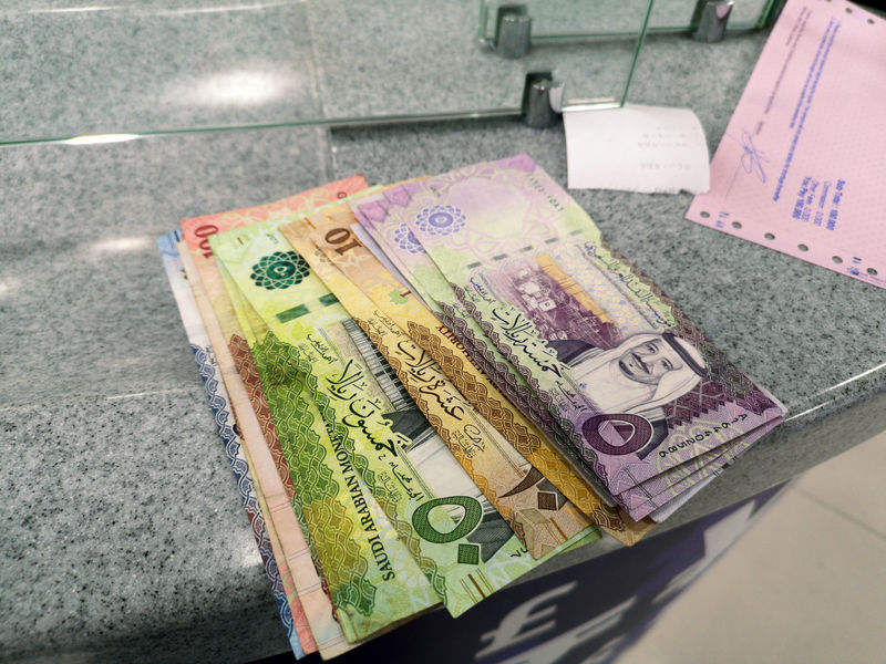 © Reuters. Saudi currency, riyal, is seen at a local currency exchange in Manama