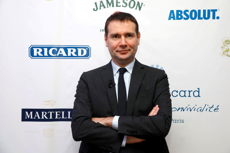 © Reuters. FILE PHOTO: Alexandre Ricard, Chairman and CEO of French drinks maker Pernod Ricard, poses before a news conference to present the company's first-half earnings in Paris