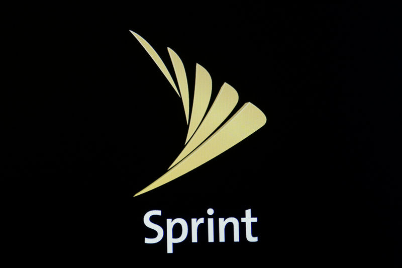 © Reuters. The Sprint logo is displayed on a a screen on the floor of the NYSE in New York City