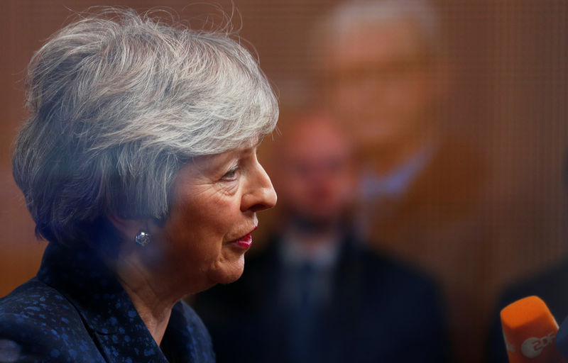 © Reuters. British PM May speaks to the press at the European Council headquarters in Brussels