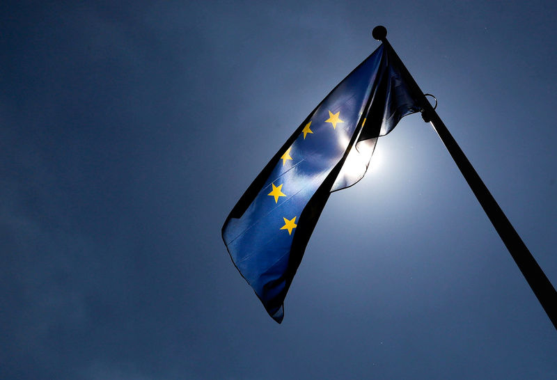 © Reuters. FILE PHOTO: A European Union flag flutters outside the EU Commission headquarters in Brussels