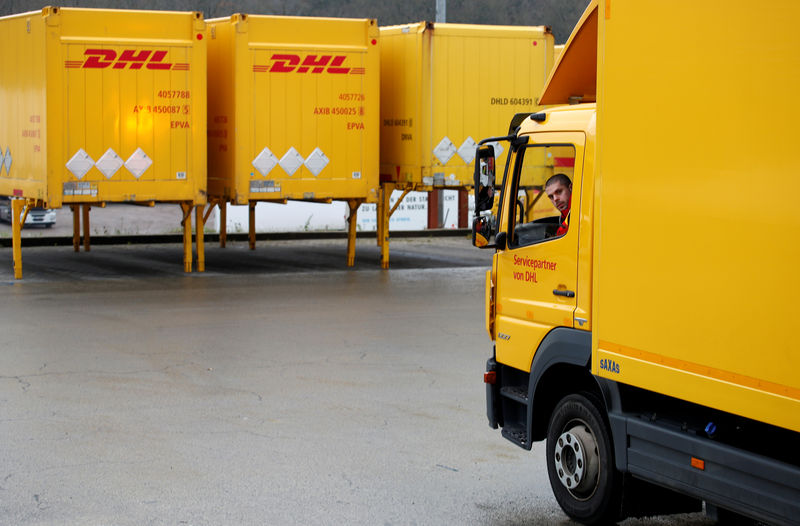 © Reuters. FILE PHOTO: Klankert, a 27-year-old truck driver of German postal and logistics group Deutsche Post DHL steers his truck at a DHL freight logistics centre in Sehlem