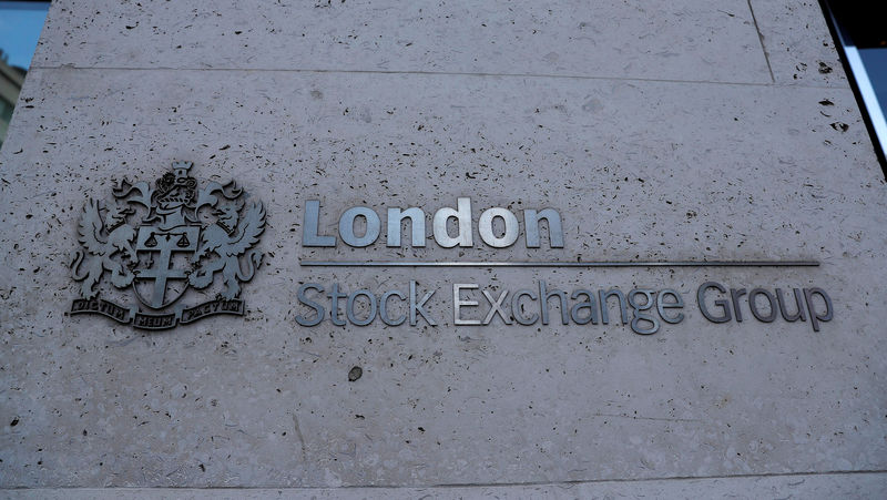 © Reuters. FILE PHOTO: Signage is seen outside the entrance of the London Stock Exchange in London