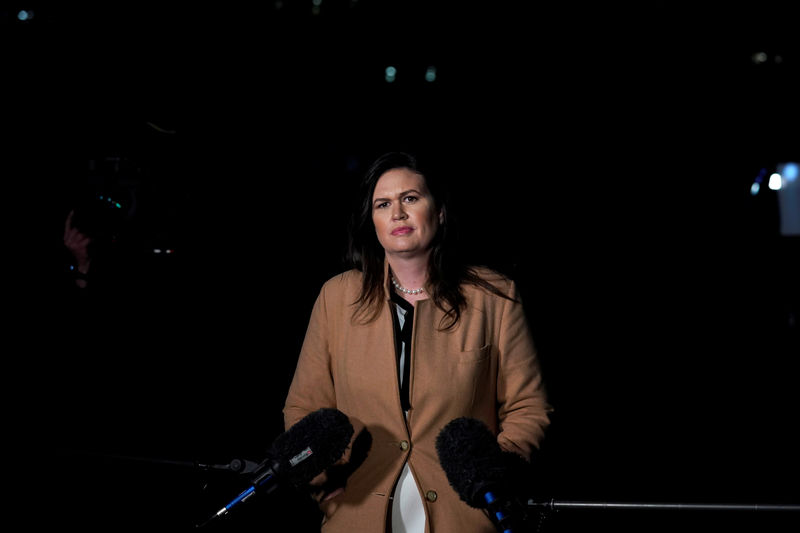 © Reuters. White House Press Secretary Sarah Huckabee Sanders talks to the media at the White House