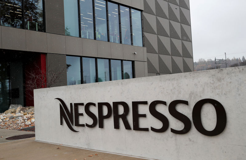 © Reuters. FILE PHOTO: A logo is pictured outside the Nespresso plant in Romont