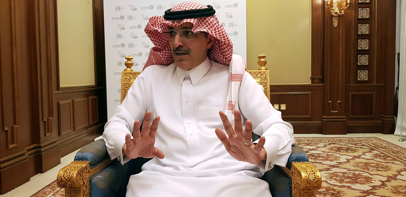 © Reuters. Saudi Minister of Finance Mohammed al-Jadaan speaks during an interview with Reuters at the Ritz-Carlton Hotel in Riyadh