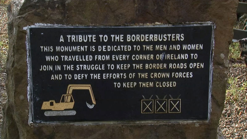 © Reuters. A plaque in front of the 'border buster' JCB digger on the border near Kinawley in Northern Ireland and Swanlinbar in Ireland