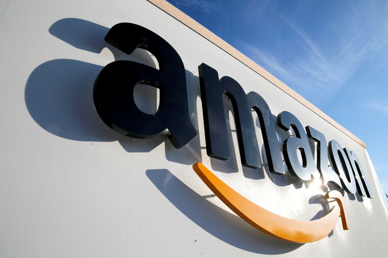 © Reuters. FILE PHOTO: The logo of Amazon is seen at the company logistics centre in Boves