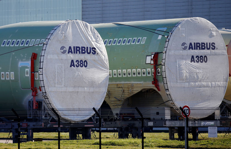 © Reuters. Sections of Airbus A380 are seen outside the final assembly line site at Airbus headquarters in Blagnac