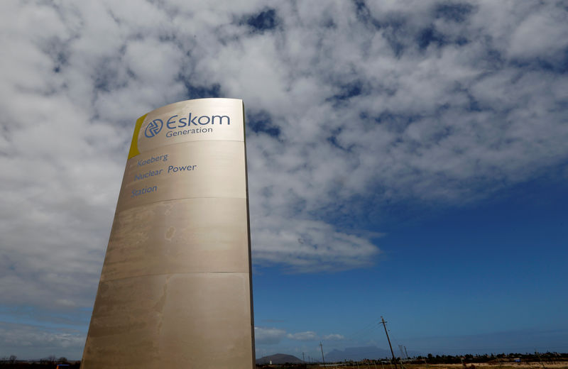 © Reuters. FILE PHOTO: The logo of state power utility Eskom  is seen outside Cape Town's Koeberg nuclear power plant